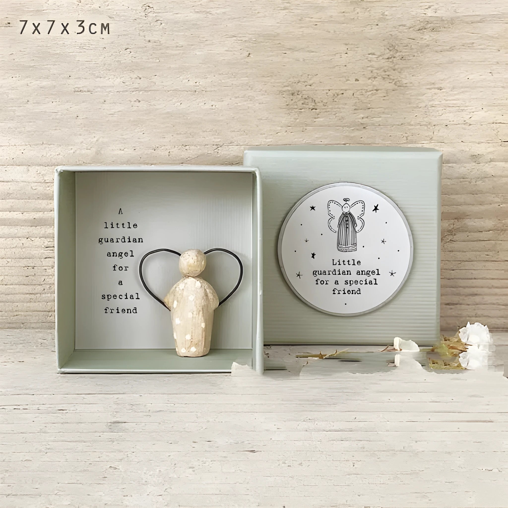 Boxed modern style resin Guardian Angel ornament gift for friends.