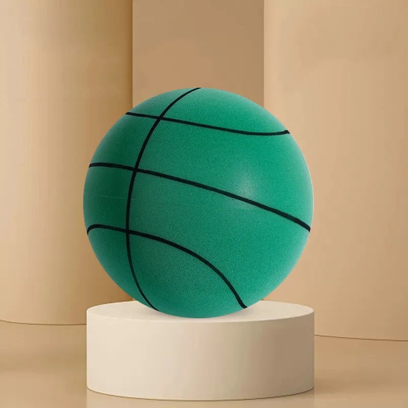 Assortment of bright coloured silent foam basketballs with a basketball frame on a neutral background
