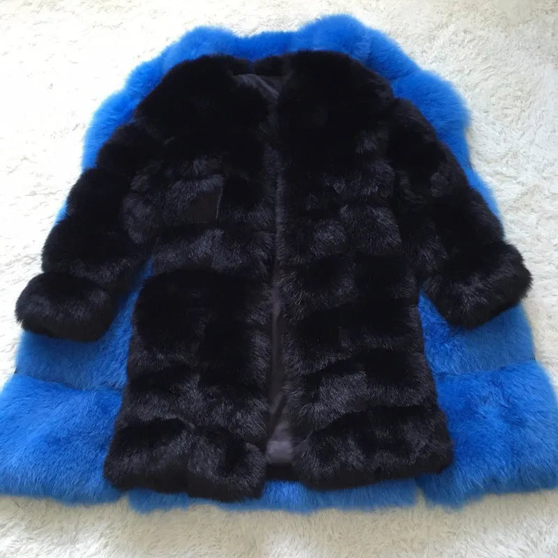 Women's long artificial fur coat in wine red colour on a hanger