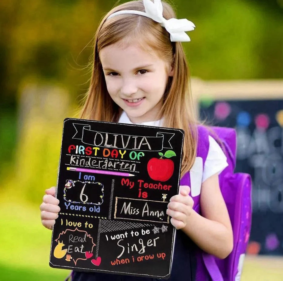 Wooden first day of school blackboard sign measuring 25.5 by 30 centimetres