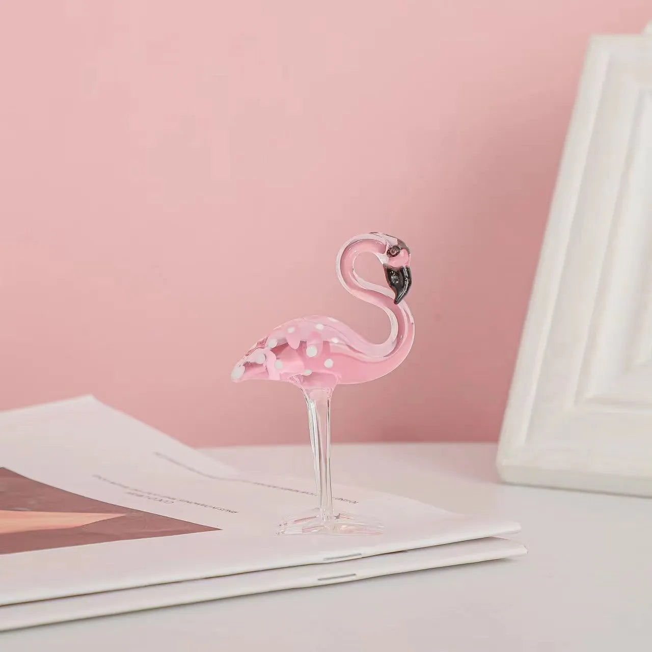 Pink crystal flamingo decorative figurine on table with modern simple style