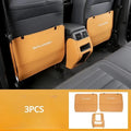 Set of three black leather anti-kick pads for Mitsubishi Outlander rear seats