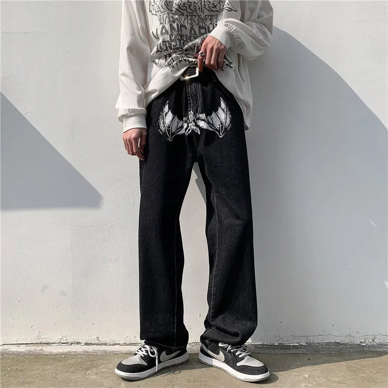 Mens casual print loose jeans in black, showing elasticated waist and relaxed fit