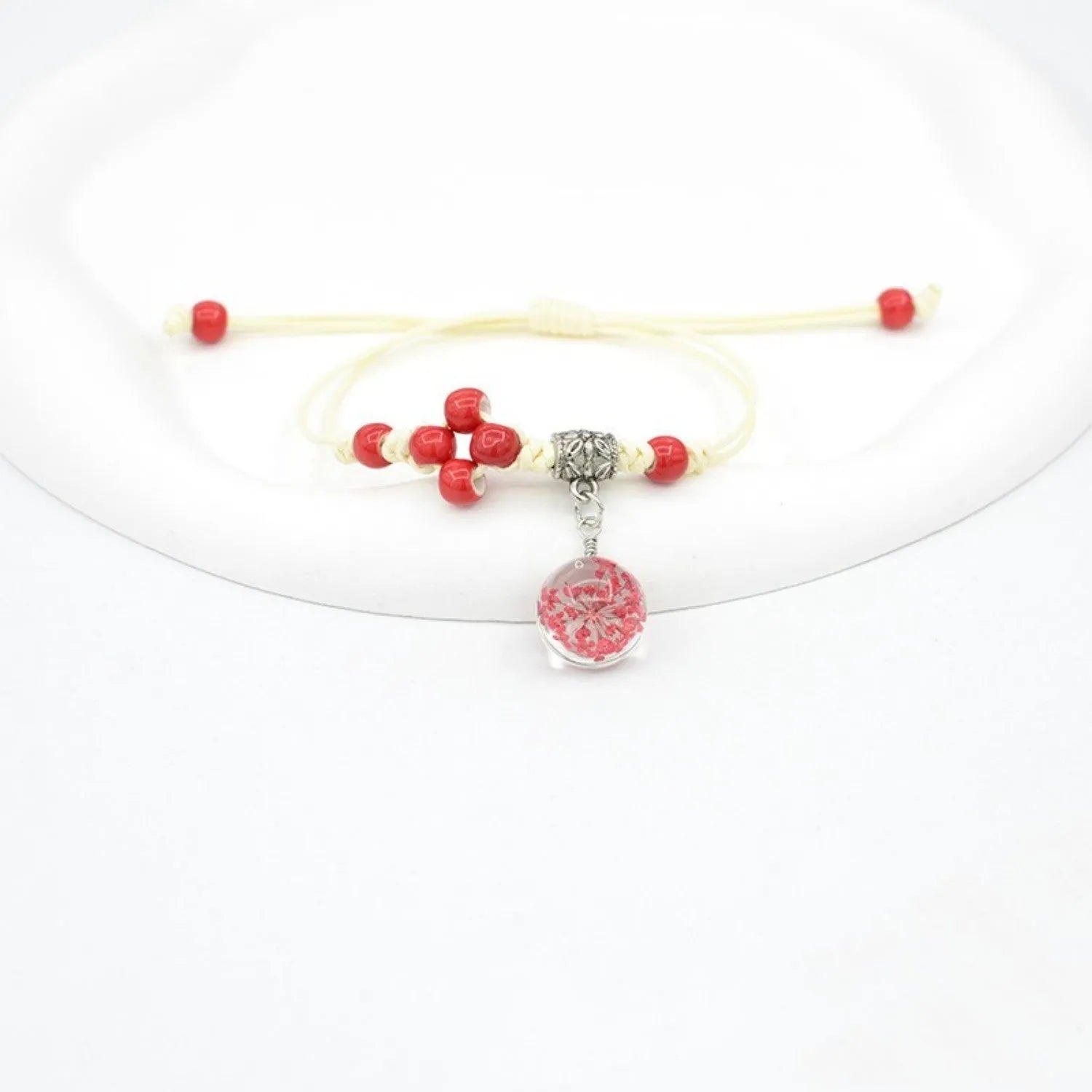 Women's hand-woven glass dried flower bracelet with large 1.4 cm beads in multiple colour options.