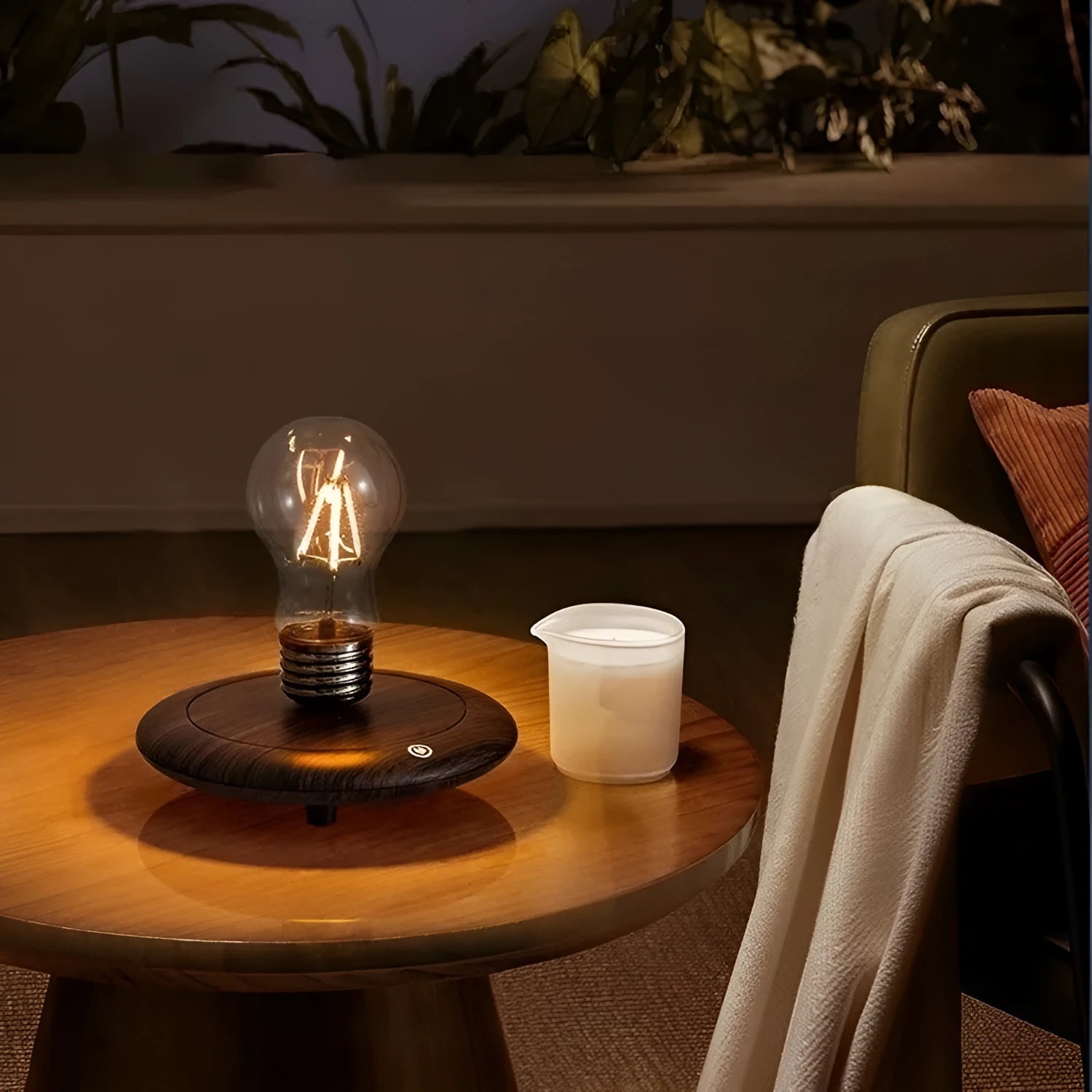 Creative iron art night lamp with a suspended bulb on a black wood grain base.