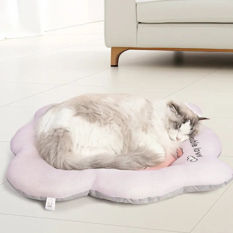Green reversible pet cooling mat for dogs and cats showing soft fabric side and non-slip backing.
