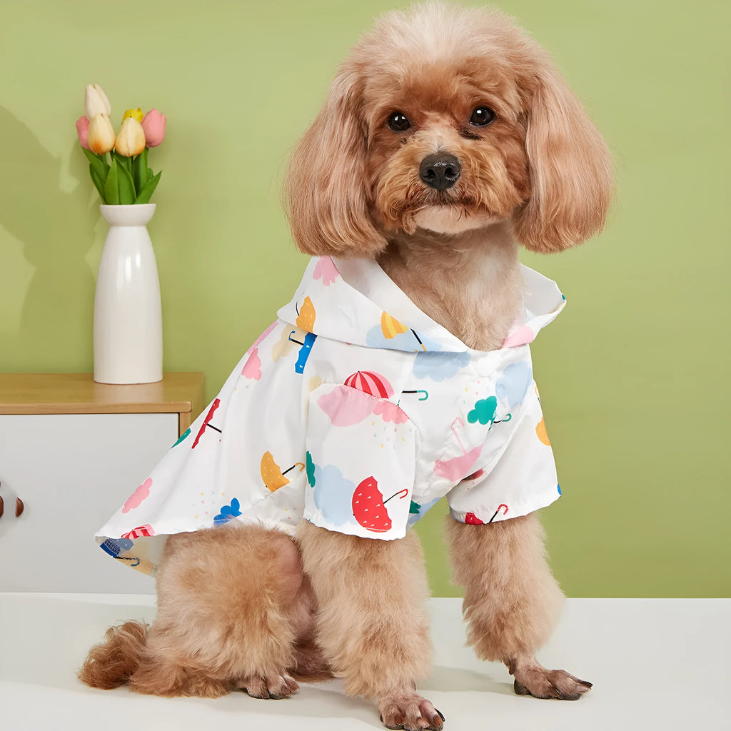 Colourful cartoon umbrella pattern pet raincoat for dogs or cats, available in sizes XS to XL.