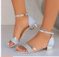 Women's Roman style sandals with rhinestone decoration and buckle closure in black colour