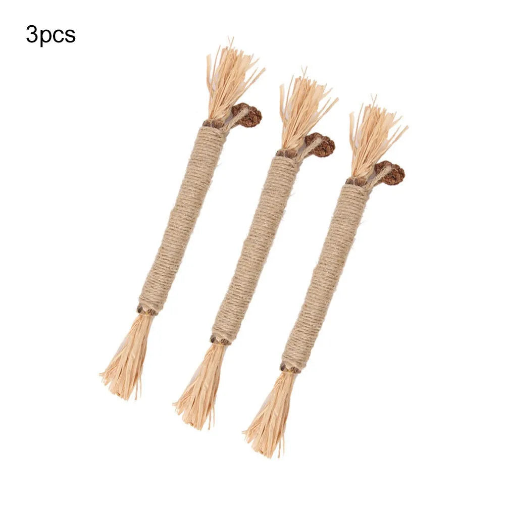Three natural silvervine chew sticks for cats on a wooden surface, showing thick and fine diameter options