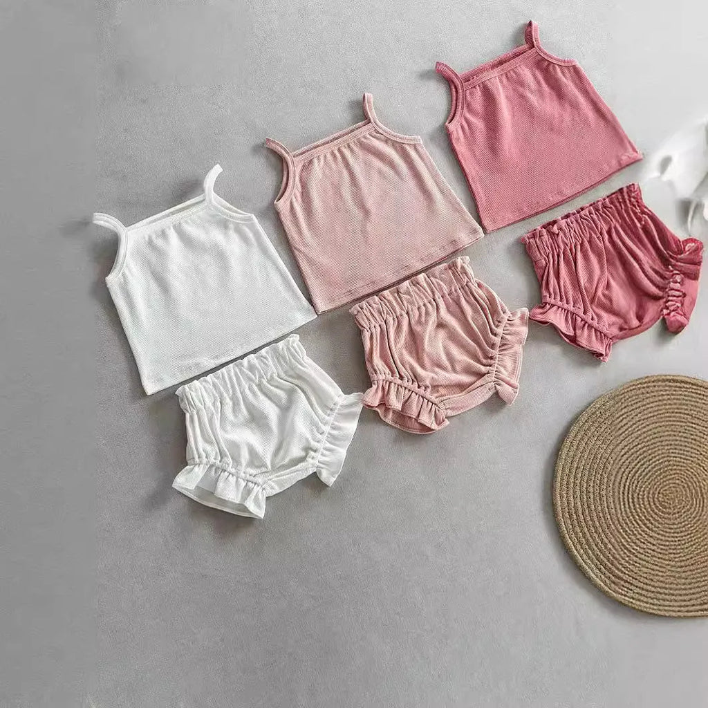Women's cotton rib home wear two-piece set with sleeveless top and shorts in rose colour on white background