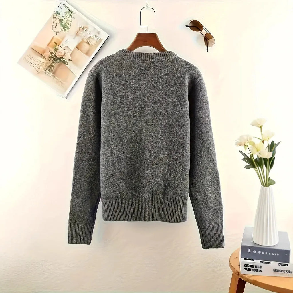 Dark grey solid colour women's polyester cardigan sweater with button front and long sleeves.