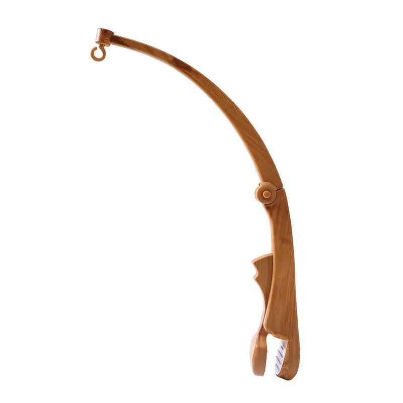Newborn wood grain bracket music box bed bell in brown, foldable plastic, for infant cot use