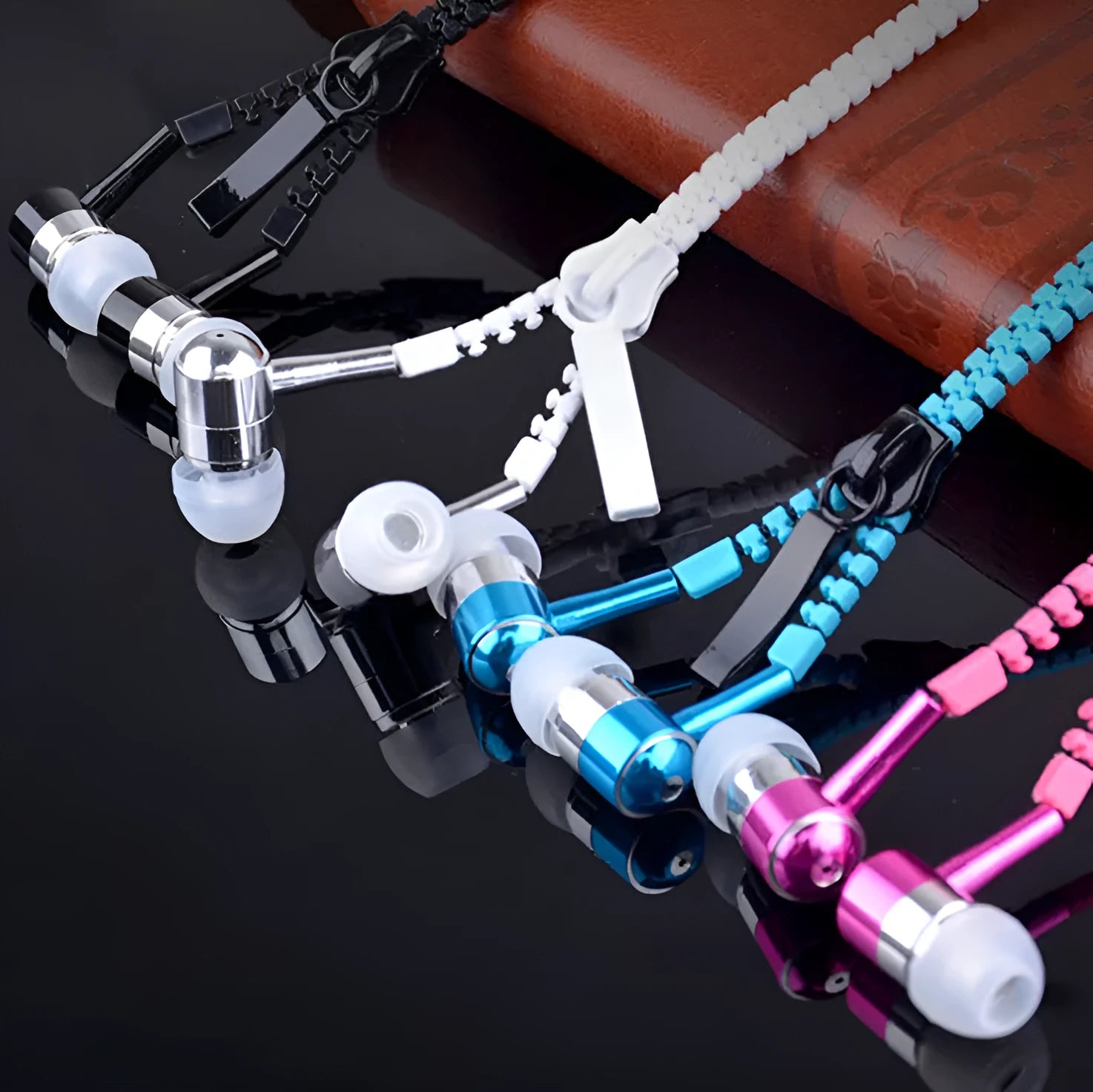 Blue wired earphones with glowing zipper cord, alloy metallic housing, and gold-plated 3.5mm plug