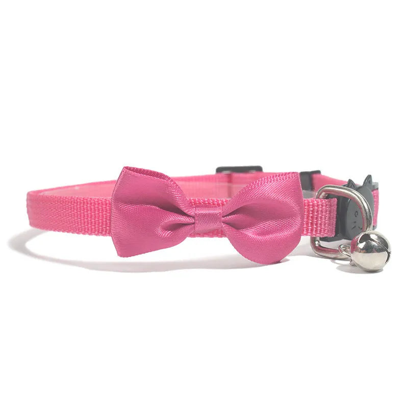 Striped multi-colour adjustable nylon cat collar with a small bell attached.