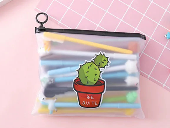 Set of 20 black 0.5mm ballpoint pens with cartoon cactus designs in plastic storage case measuring 21cm by 17cm