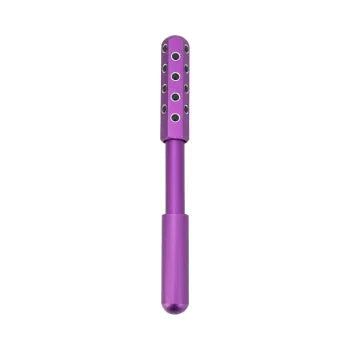 Purple handheld facial massage roller with visible germanium beads on a rotating head