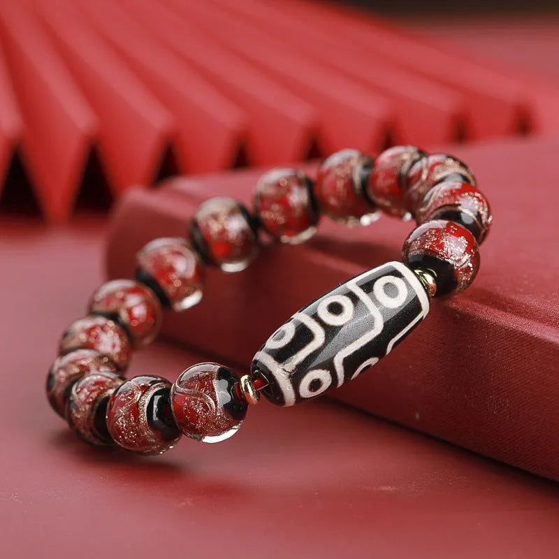 Handcrafted Chinese coloured glaze bracelet with snake year beads in auspicious patterns