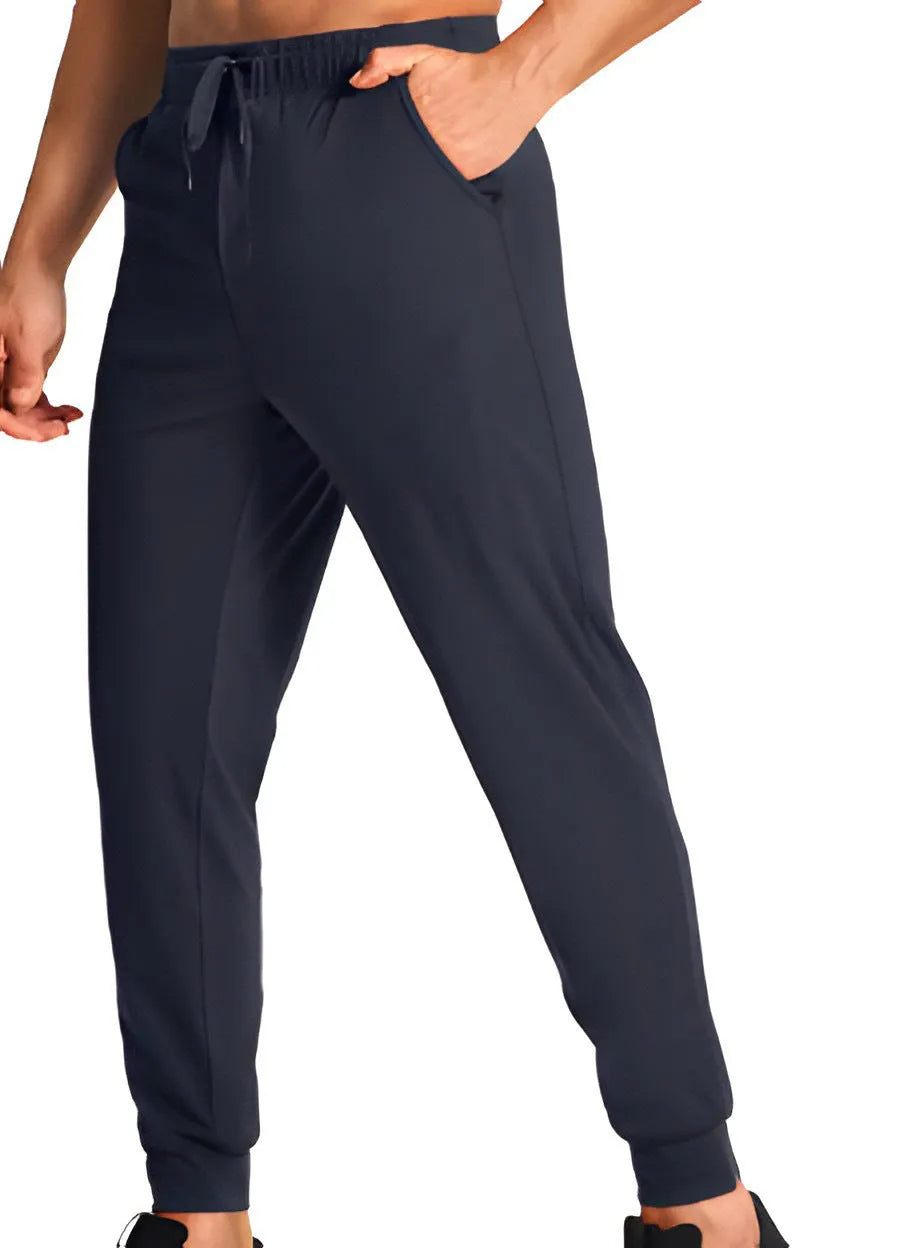 Men's loose fit casual trousers in polyester fabric available in multiple solid colours and sizes