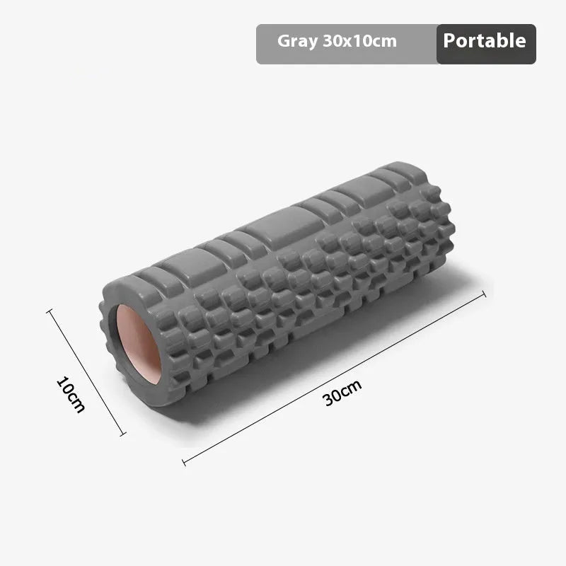 EVA foam roller for fitness in various colours and sizes on a gym floor.