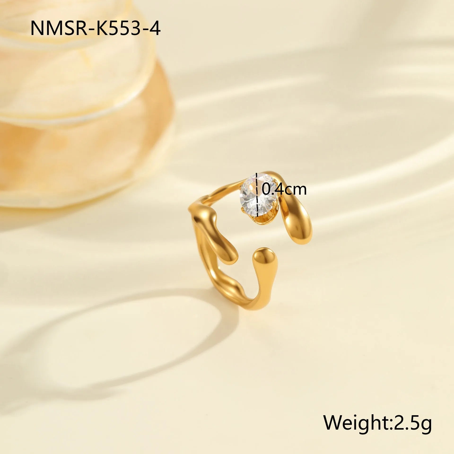 Adjustable geometric stainless steel ring showing open mouth design and colour variations