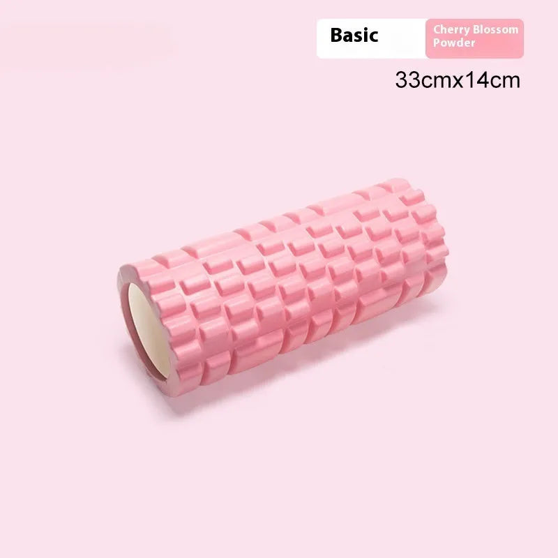 EVA foam roller for fitness in various colours and sizes on a gym floor.