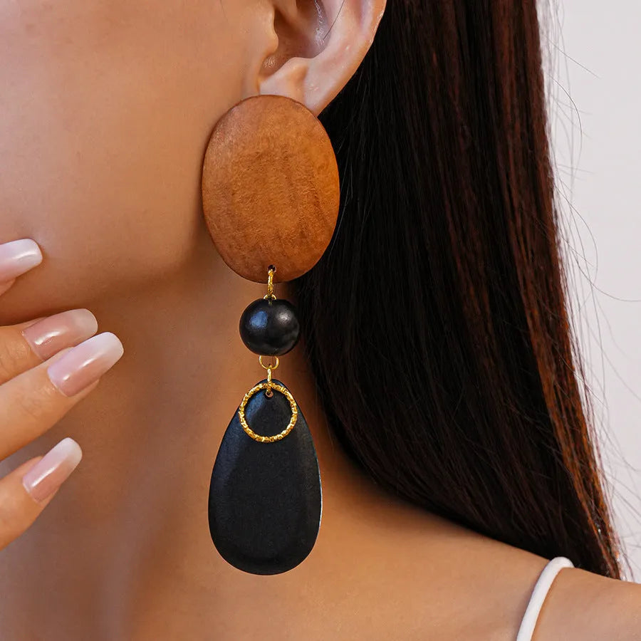 Wooden handmade retro fashion earrings with ellipse shape and brown-black colour combination
