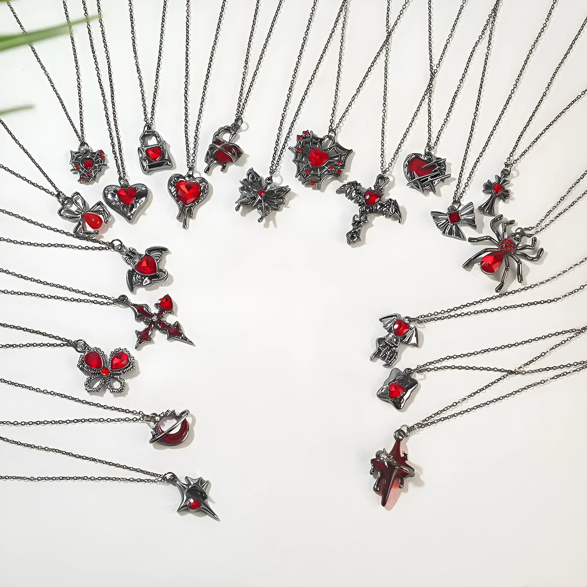 Halloween necklace with zinc alloy pendant showing bat, spider and celestial designs in electroplated colours