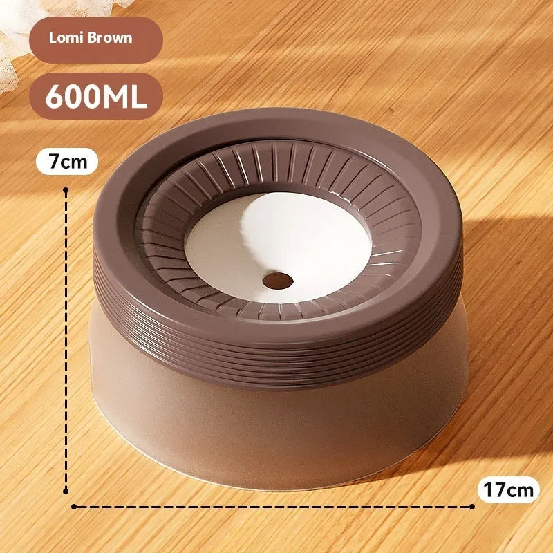 Green raised suspension water bowl for a dog on a white plate
