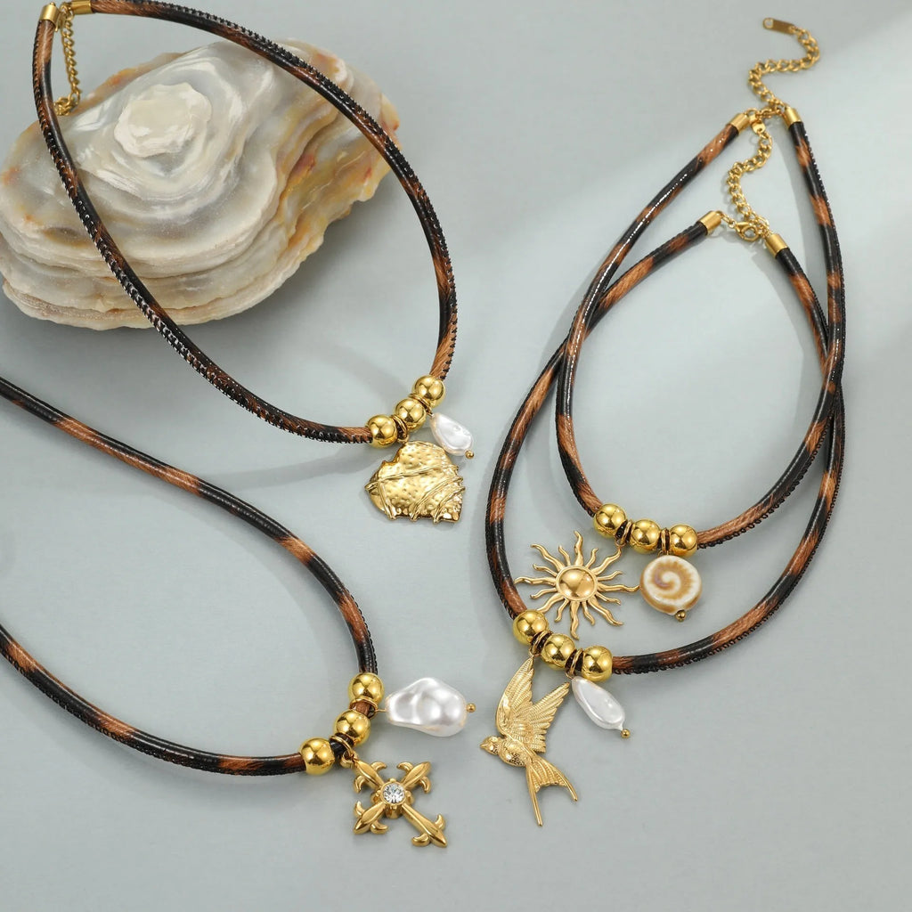 Women's stainless steel necklace with leopard print geometric pendant and gold electroplated finish