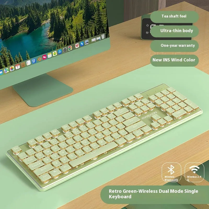 Prewalker V3 silent keyboard and mouse set in retro green colour on a desk.