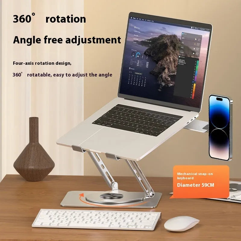 Silver carbon steel laptop stand with rotating base and integrated magnetic side phone holder.