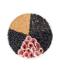 Black wolfberry mulberry fig flaxseed herbal tea packs and free cup on table