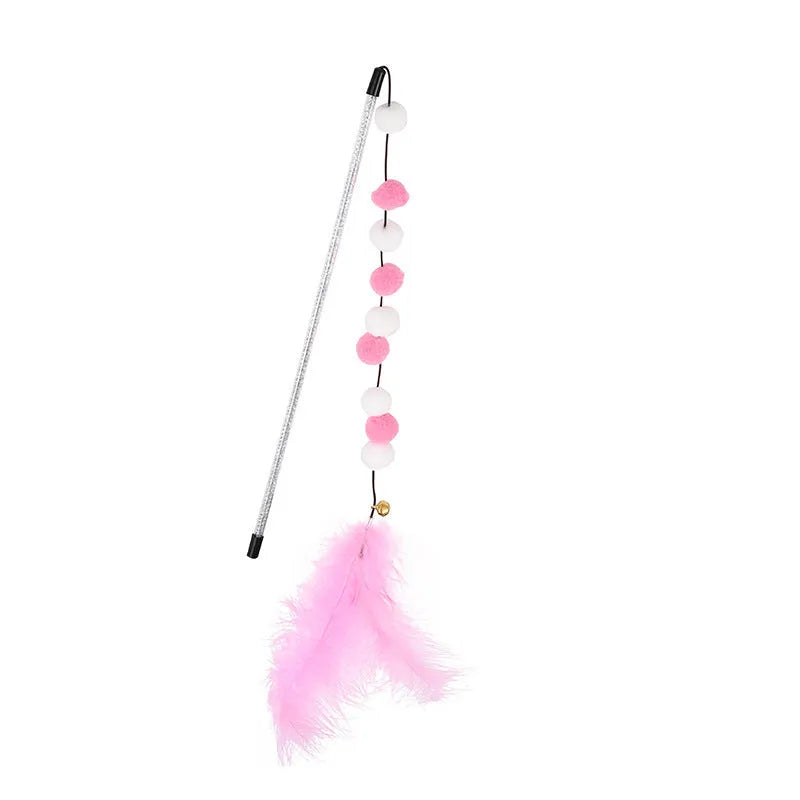 Blue cat teaser stick toy with a bell and a grey pompon feather, shown at approximate 31cm length.