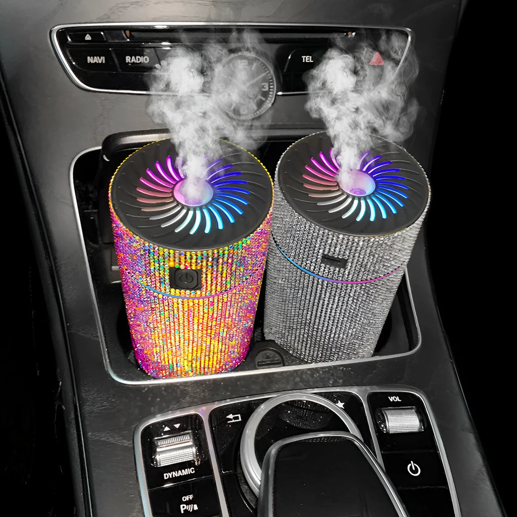 Compact white car air humidifier and purifier with USB cable on a car dashboard
