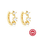 Sterling silver geometric stud earrings with round diamond accents in gold and silver electroplated finishes
