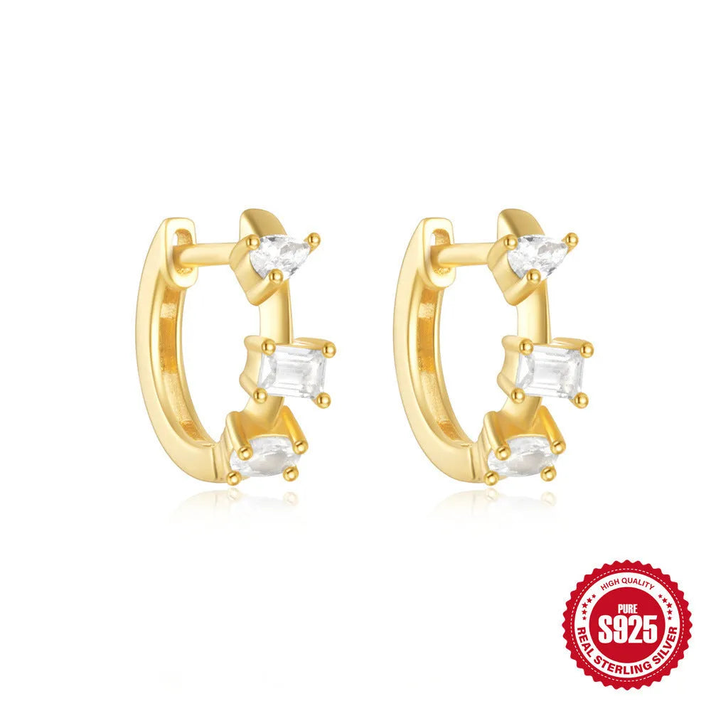 Sterling silver geometric stud earrings with round diamond accents in gold and silver electroplated finishes