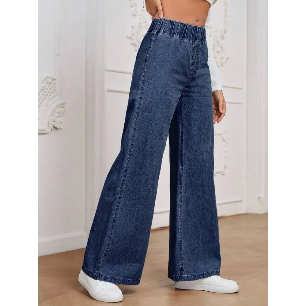 Plus size light blue wash wide leg jeans with straight fit and zip fly