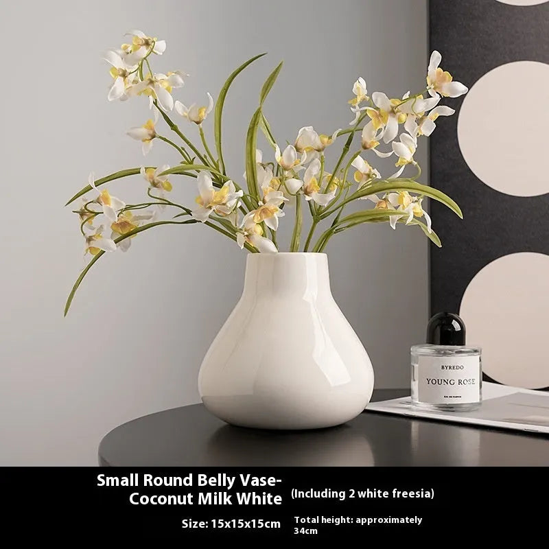 Ceramic decorative vase with orchid flowers in modern simplicity style