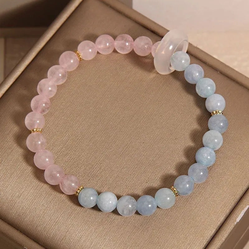 Women's aquamarine crystal bracelet with pink and blue dopamine colours, round geometric beads, handcrafted mixed materials