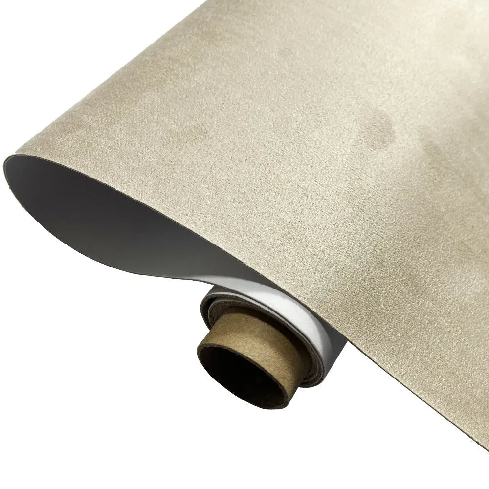 Rolls and sheets of coloured self-adhesive suede leather material for DIY projects.