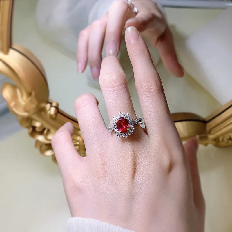 Silver oval pigeon egg surround setting ring for women, red electroplated, camellia detail, sizes No 5-9