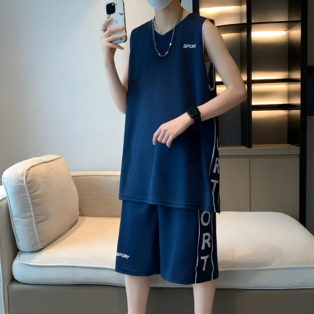 Men's basketball sleeveless vest and shorts set in polyester, available in five colours, front view