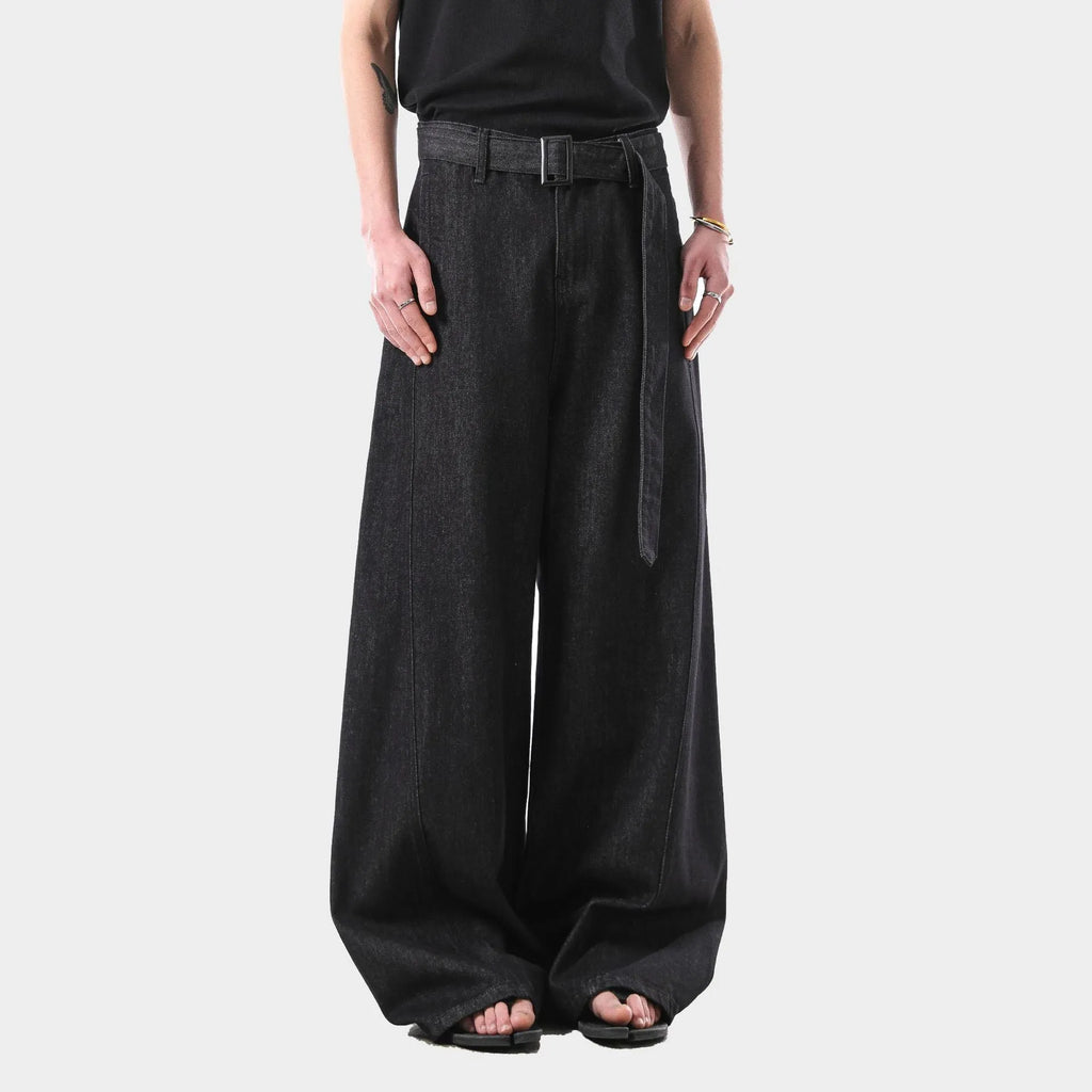 Black high waist straight leg women's jeans with gold detailing on a mannequin.