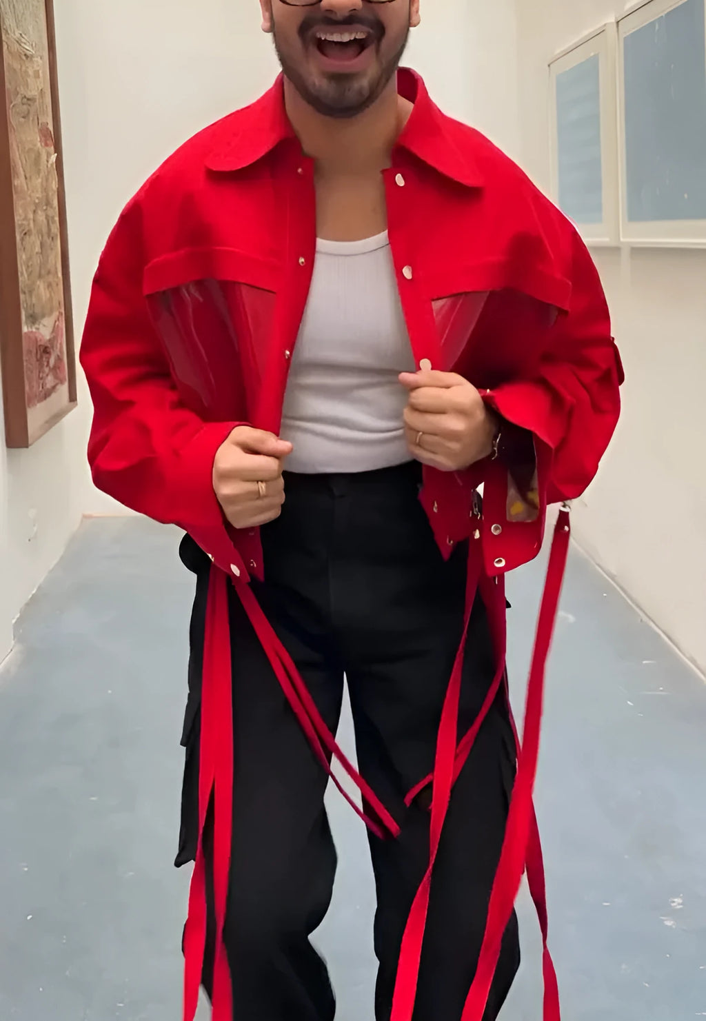 Men's red short jacket on display showing front view and cropped cut