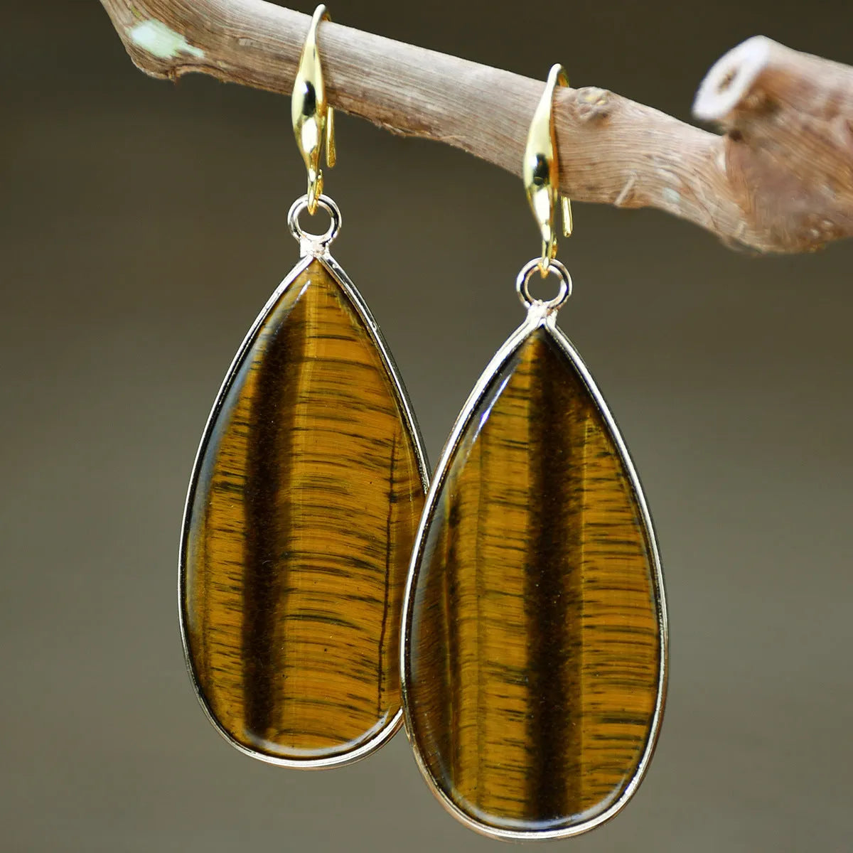 Vintage Tigereye stone drop earrings with handcrafted texture details and water drop pendant shape