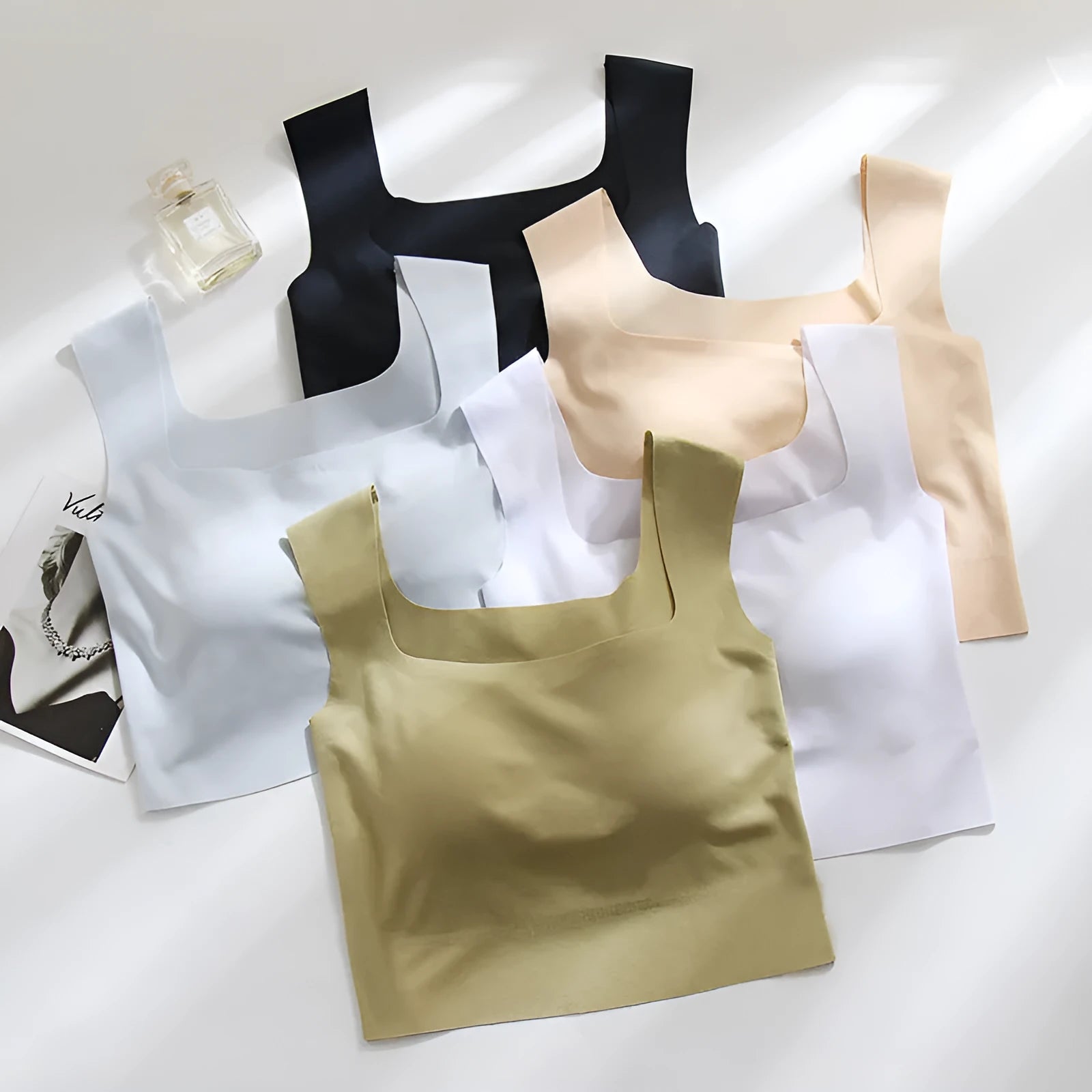 Seamless non-marking sling vest for women with thin mould cup and chest pad in light sports style.