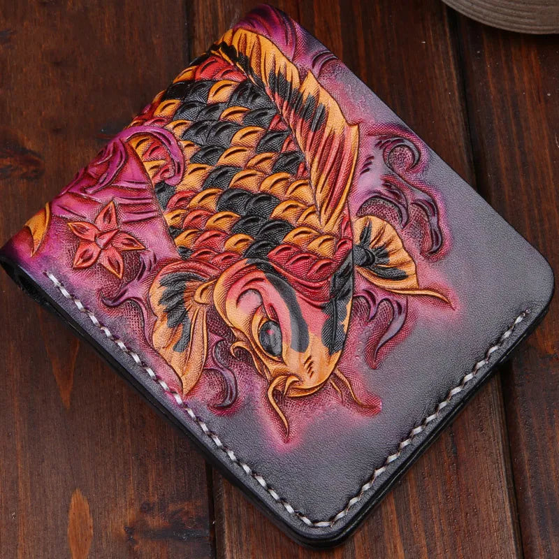 Men's blue cow leather short wallet with manual carving and open closure.