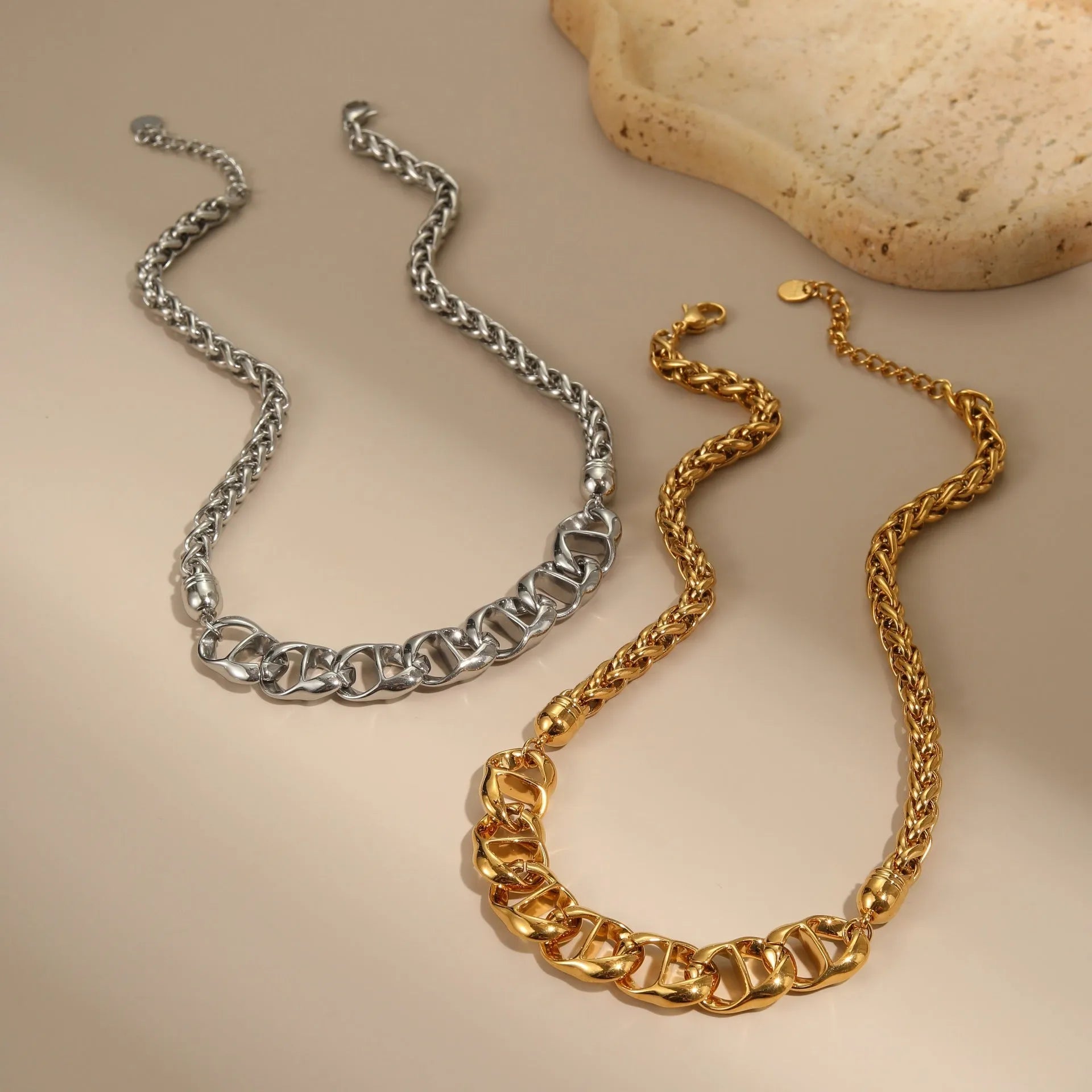 Women's gold-plated stainless steel necklace with geometric pendant design on regular chain