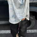 Korean-style loose fit T-shirt with distressed summer wash and tie dye print on solid colour polyester.