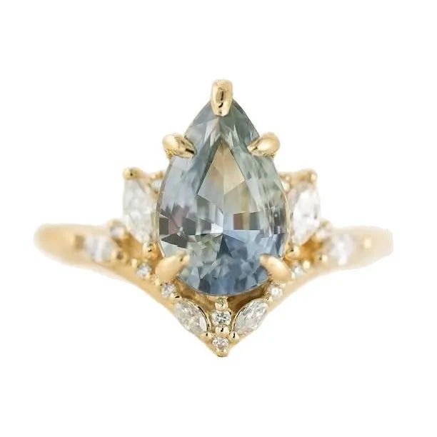Gold alloy women's floral ring with blue crystal diamond inlay, side view